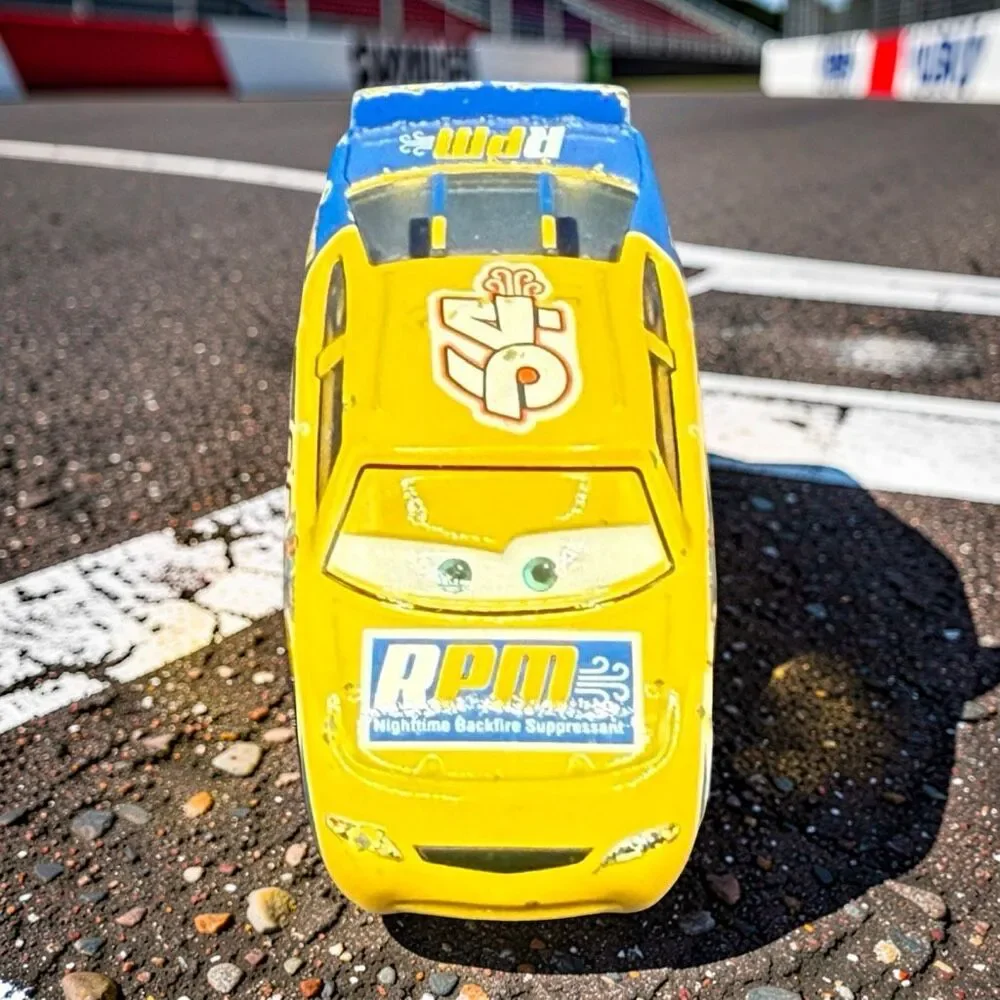 Disney Pixar Cars Winford Bradford Rutherford Yellow Die Cast Race Car A71